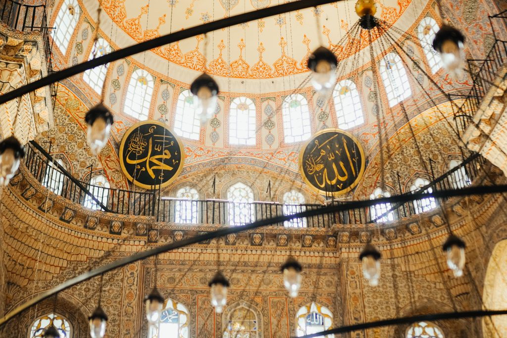 Beautifully ornate interior dome showcasing Islamic art and architecture.